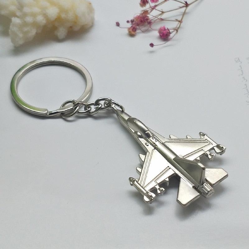 Metal keychain in the shape of an F16 airplane - One Beast Garage